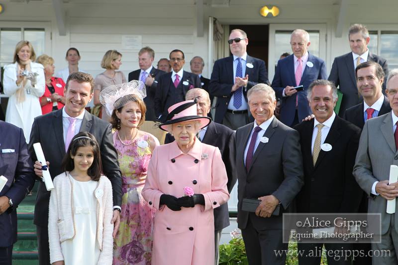 Queen Elizabeth II awards certificates to those responsible for taking the violence out of the training of horses using Monty Robert’s concepts. (Photo courtesy of Alice Giipps.)