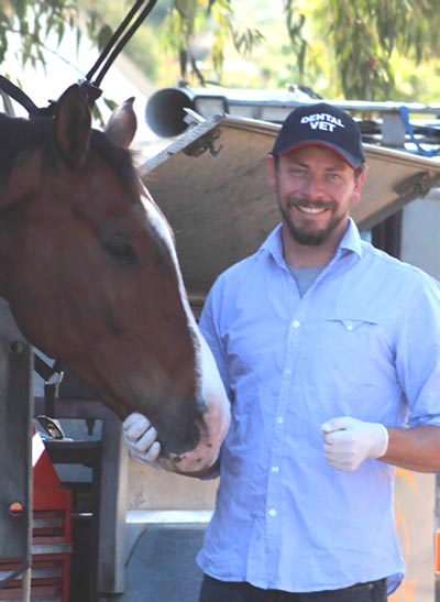 Dr Shannon Lee preparing for surgery. Image courtesy of Advanced Equine Dentistry.