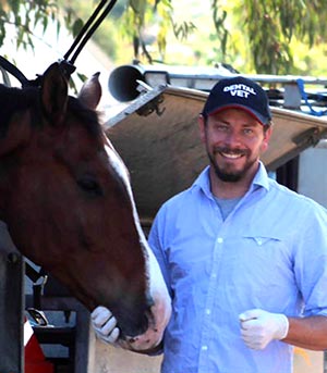 Dr Shannon Lee preparing for surgery. Image courtesy of Advanced Equine Dentistry.