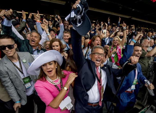 Justify's owners and friends celebrate the win. (Eclipse Sportswire)