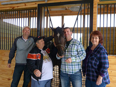 Horse Racing Nation Editor Brian Zipse, Wayne Reynolds, Scott Dick and Alice Reynolds visit with Timothy James (photo courtesy of Scott Dick).