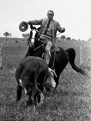 Johnson showing off his skill on Lady B, a Tennessee Walking Horse. (Getty Images)