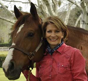 Debbie Loucks with the family's horse, Bunny, which is short for "Steel Buns."   James Oliver